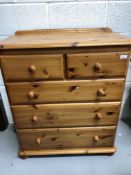 Modern pine chest of drawers, height 95cm width 81cm depth 44cm