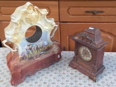 An attractive handpainted clock surround, together with a wooden cased clock.