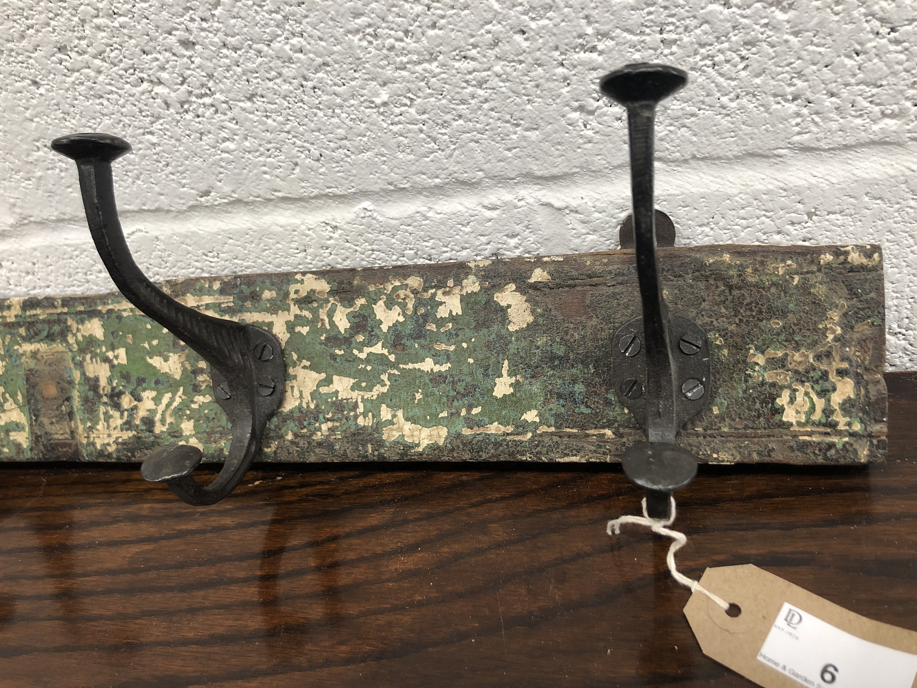 A set of metal coat hooks, attached to a rectangular wood panel. The hooks previously purchased from - Image 3 of 3