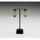 A pair of 18ct gold double hoop designer earrings each with a blue gem bead 7.2gm Condition: