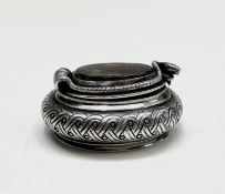 A good 19th-century silver snuff box of cushion form, the lid with cobra hinge and border and