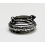 A good 19th-century silver snuff box of cushion form, the lid with cobra hinge and border and