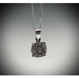 A pretty 18ct white gold diamond target cluster pendant on 9ct white gold chain, cluster diameter