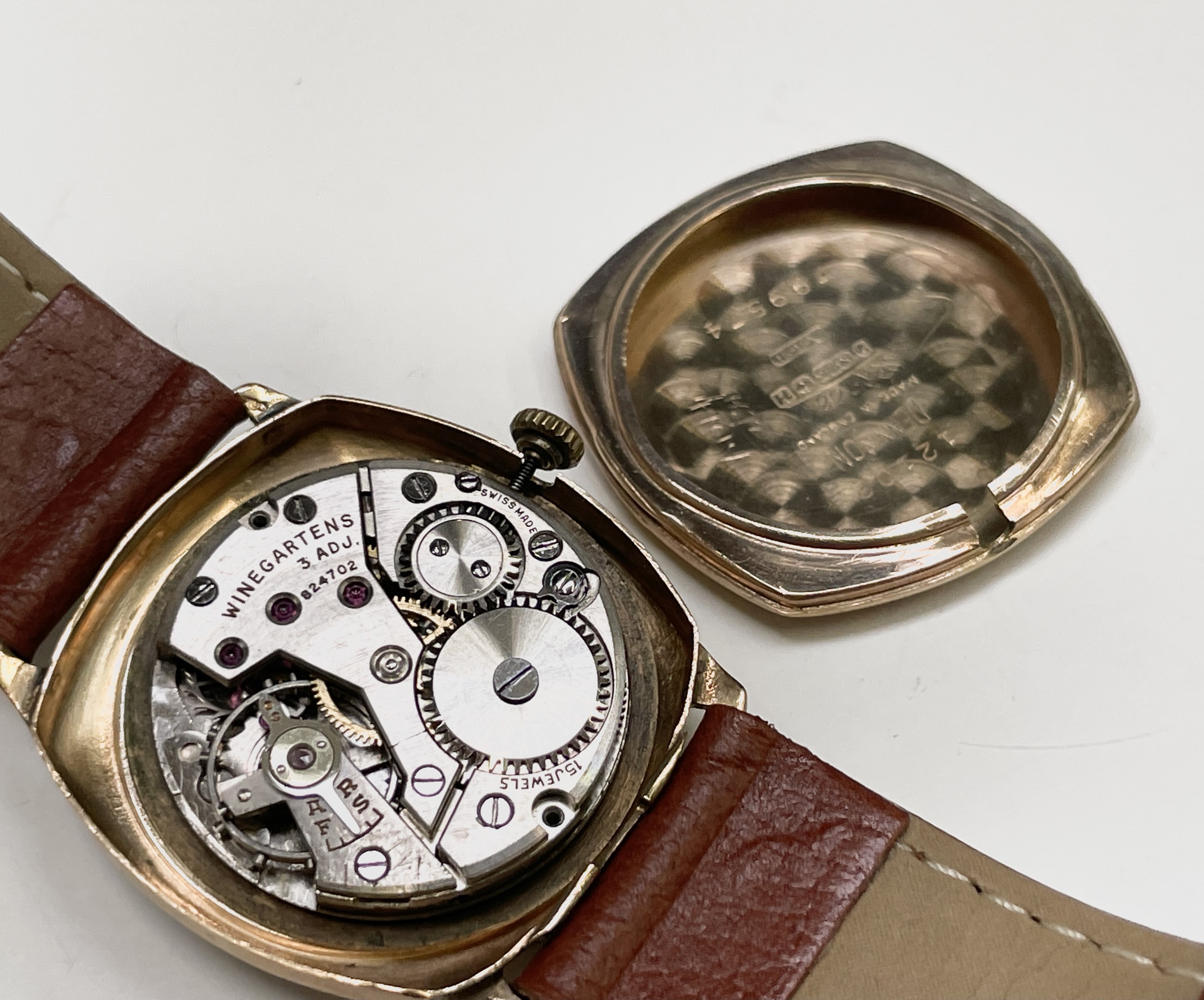 Three 9ct gold cased wristwatches each with rounded square case. Nitella, Winegartens and Avia. - Image 19 of 21