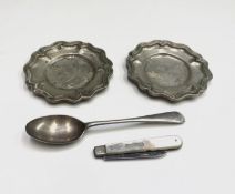 A pair of silver coloured metal dishes a silver spoon and a fruit knife UK Postage: £15.04