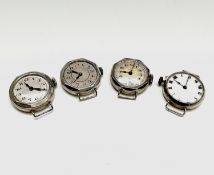 Four ladies silver cased trench style watches.