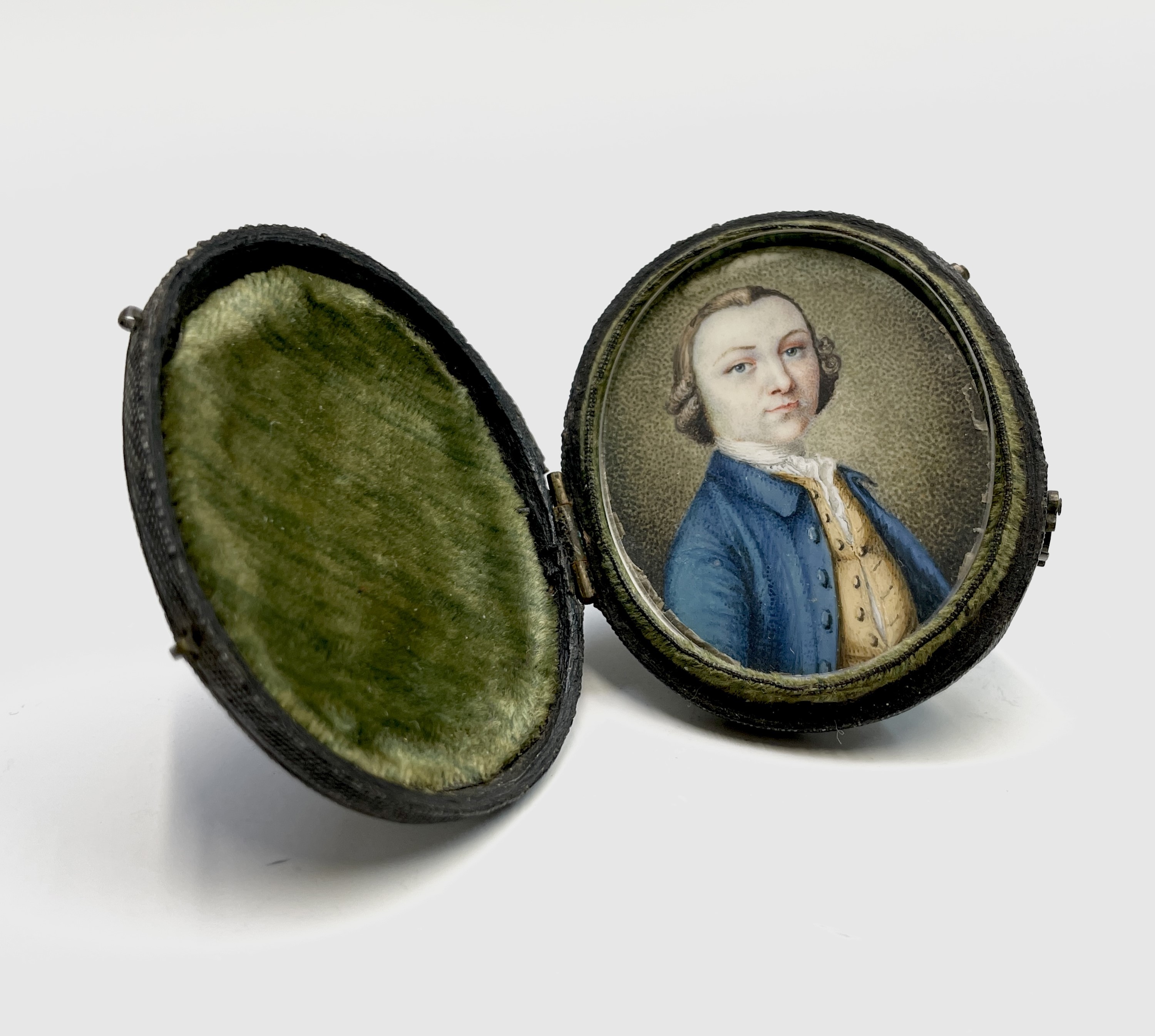 A fine mid-18th-century portrait miniature by Henry Millington(c.1735-1764) the three-quarter-length