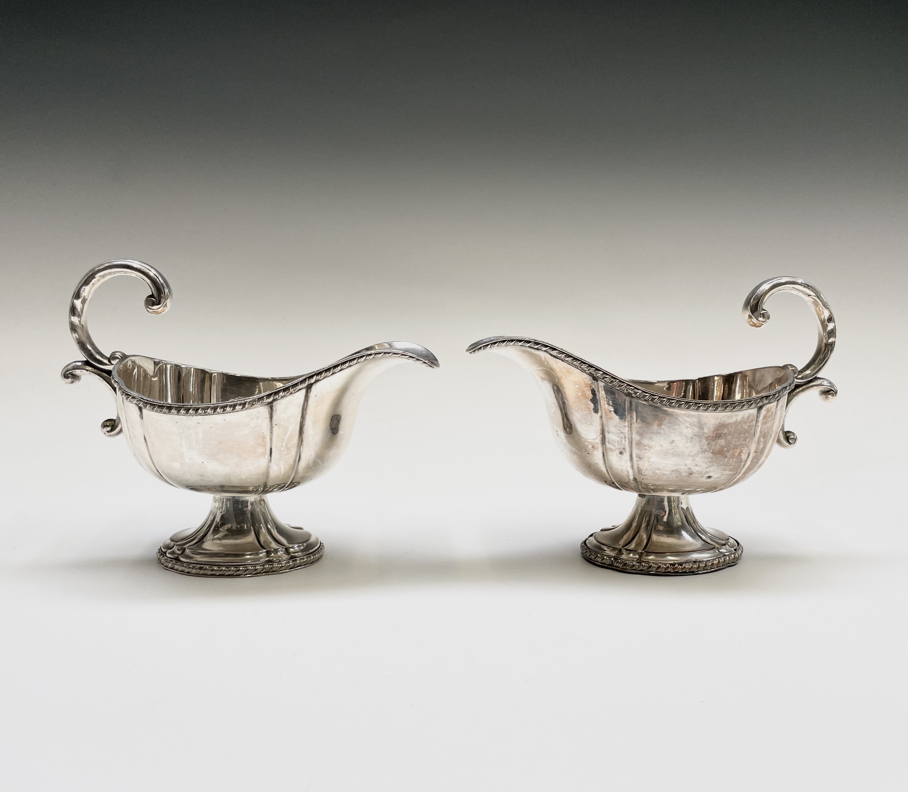 A pair of Sheffield plated sauce boats with gadrooned borders and a Sheffield plated chamberstick, - Image 2 of 6