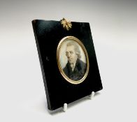 A portrait of a bewigged gentleman with blue coat attributed to John Barry (fl. 1784 - 1827) 6.5x5cm