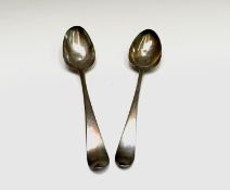 Two George III silver tablespoons marks worn, one has a lace back bowl and Hester Bateman makers