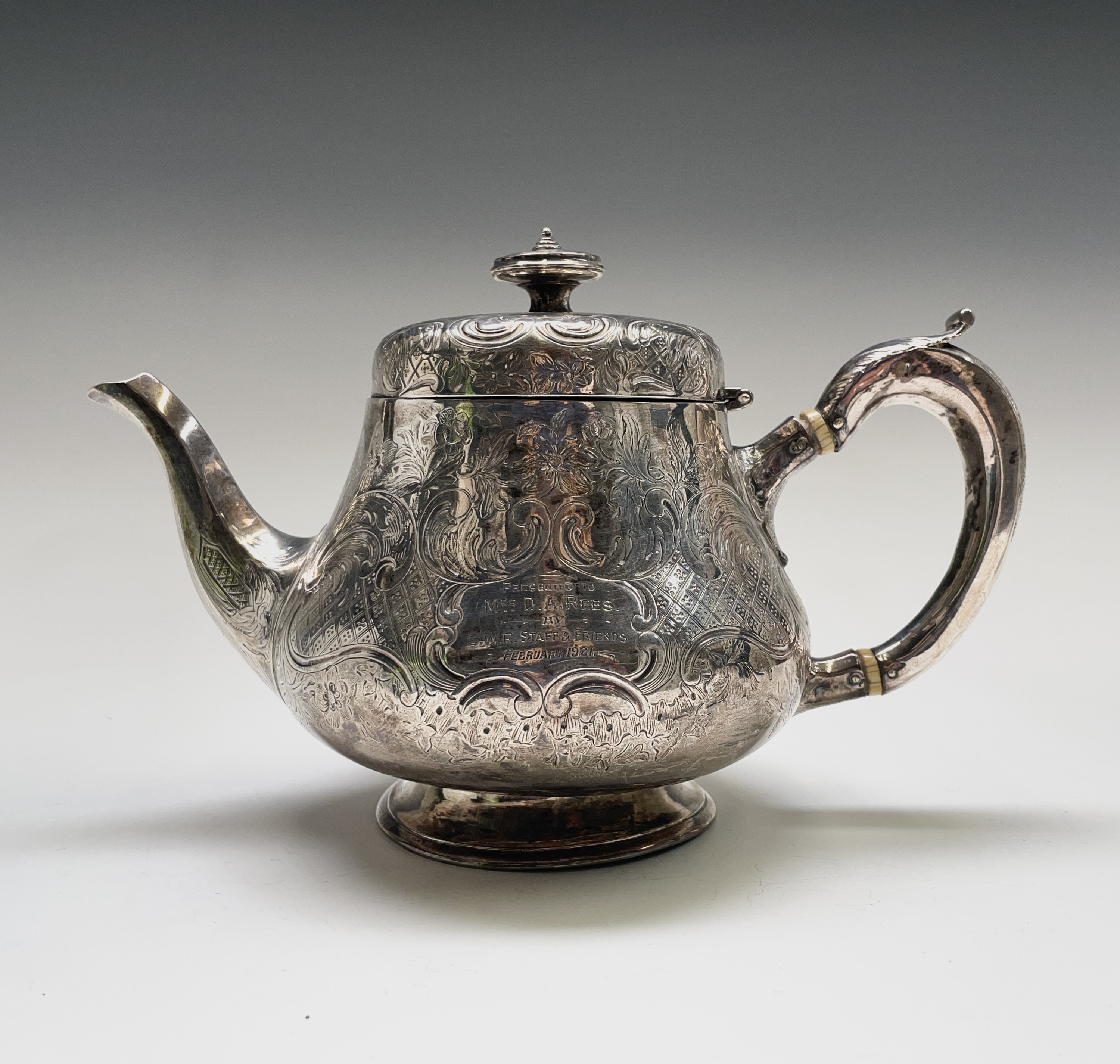A Victorian Dublin silver pear shape engraved teapot by Robert W Smith Dublin 1849 23.7oz Later G.