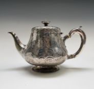 A Victorian Dublin silver pear shape engraved teapot by Robert W Smith Dublin 1849 23.7oz Later G.