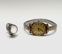 A ladies quartz Longines wristwatch and a silver moonstone ring. Condition: Ring size G/H, the watch