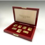 A set of seven silver-gilt replica stamps- 25th coronation anniversary 1978 173gm UK Postage: £19.56