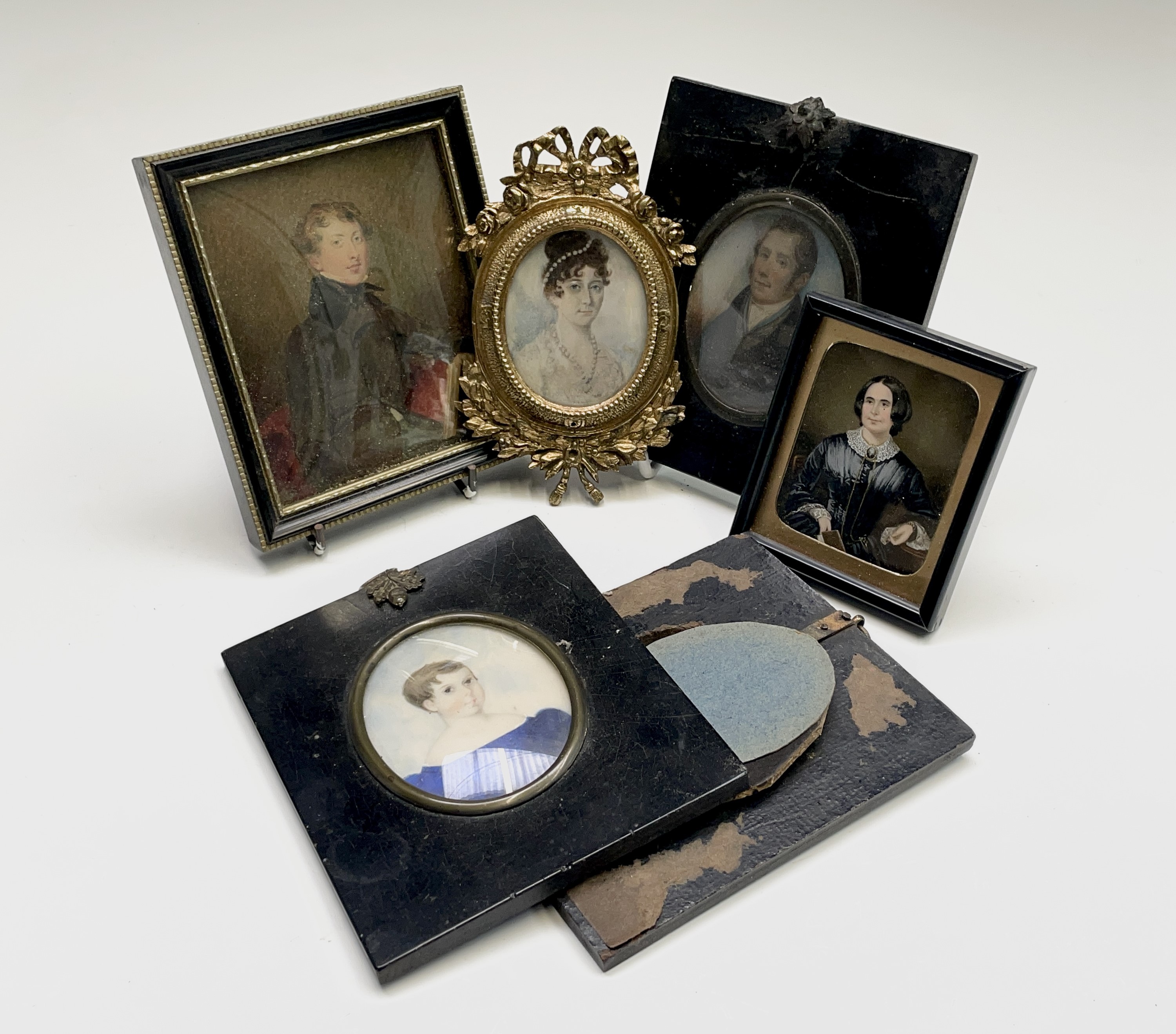 Five various miniatures and a frame Condition: See images for condition but none is in poor state.