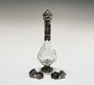 A Dutch 19th century baluster shaped clear glass perfume bottle with silver top and foot and