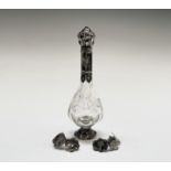 A Dutch 19th century baluster shaped clear glass perfume bottle with silver top and foot and