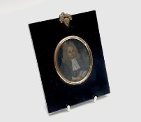 A 17th-century portrait on copper of a cleric holding a book 7.5x6.5cm Condition: Not examined out