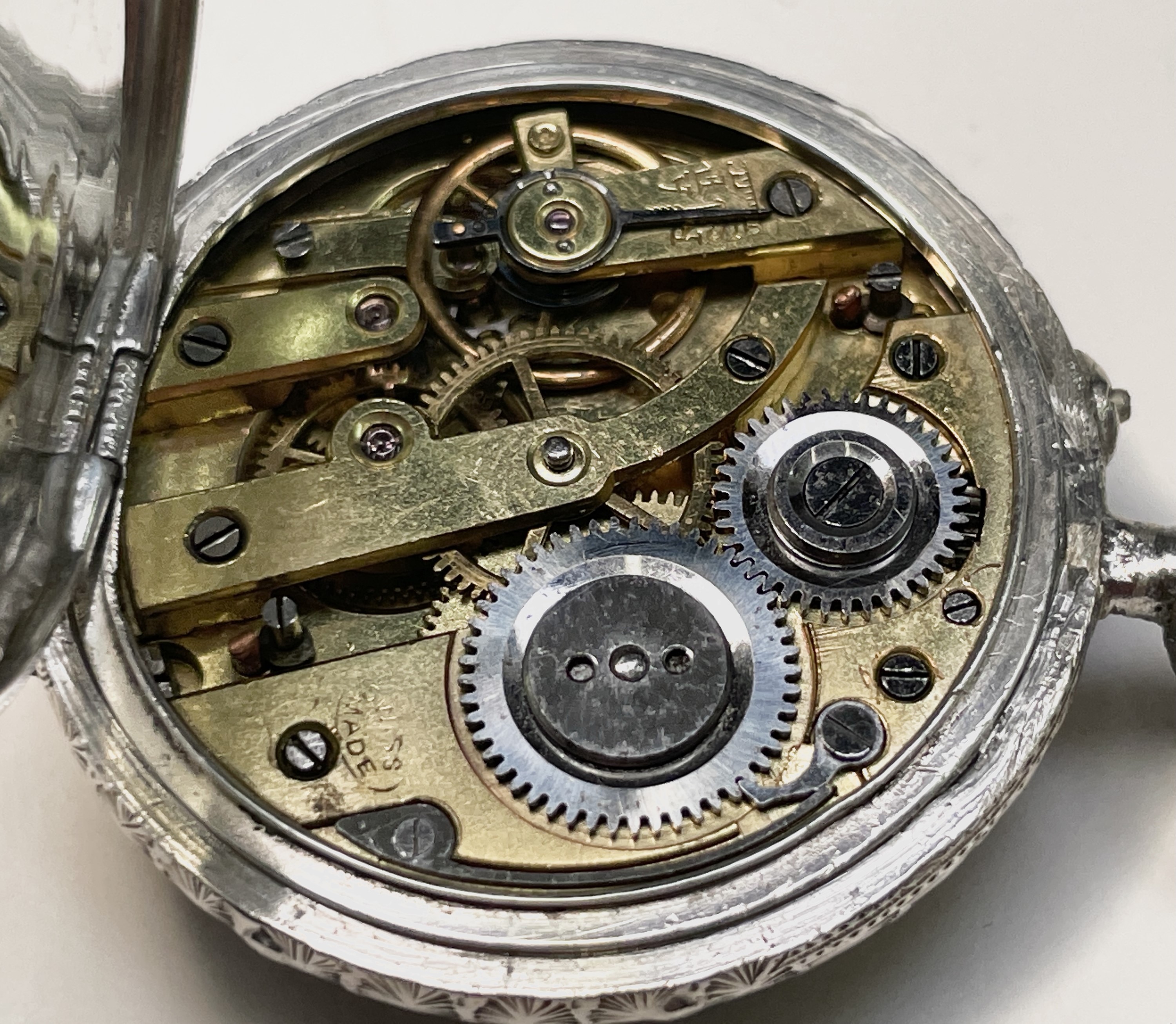 Ten silver cased keyless fob watches each with an ornamental dial and each with engraved decoration. - Image 19 of 60