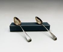 A pair of George III 'Berry Spoons' each crested and parcel gilt, Charles Hougham London 1792, 4.