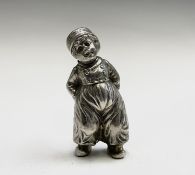 A German (Augsburg) 800 silver pepperette, modelled as a boy in traditional Dutch clothing, 97g,