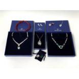 Swarovski Jewellery - Two boxed necklaces - one set with 'emerald' green and white crystals the