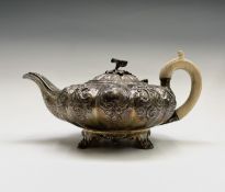 A George IV ornate melon fluted silver teapot by Rebecca Emes & Edward Barnard I London 1826 19.76oz