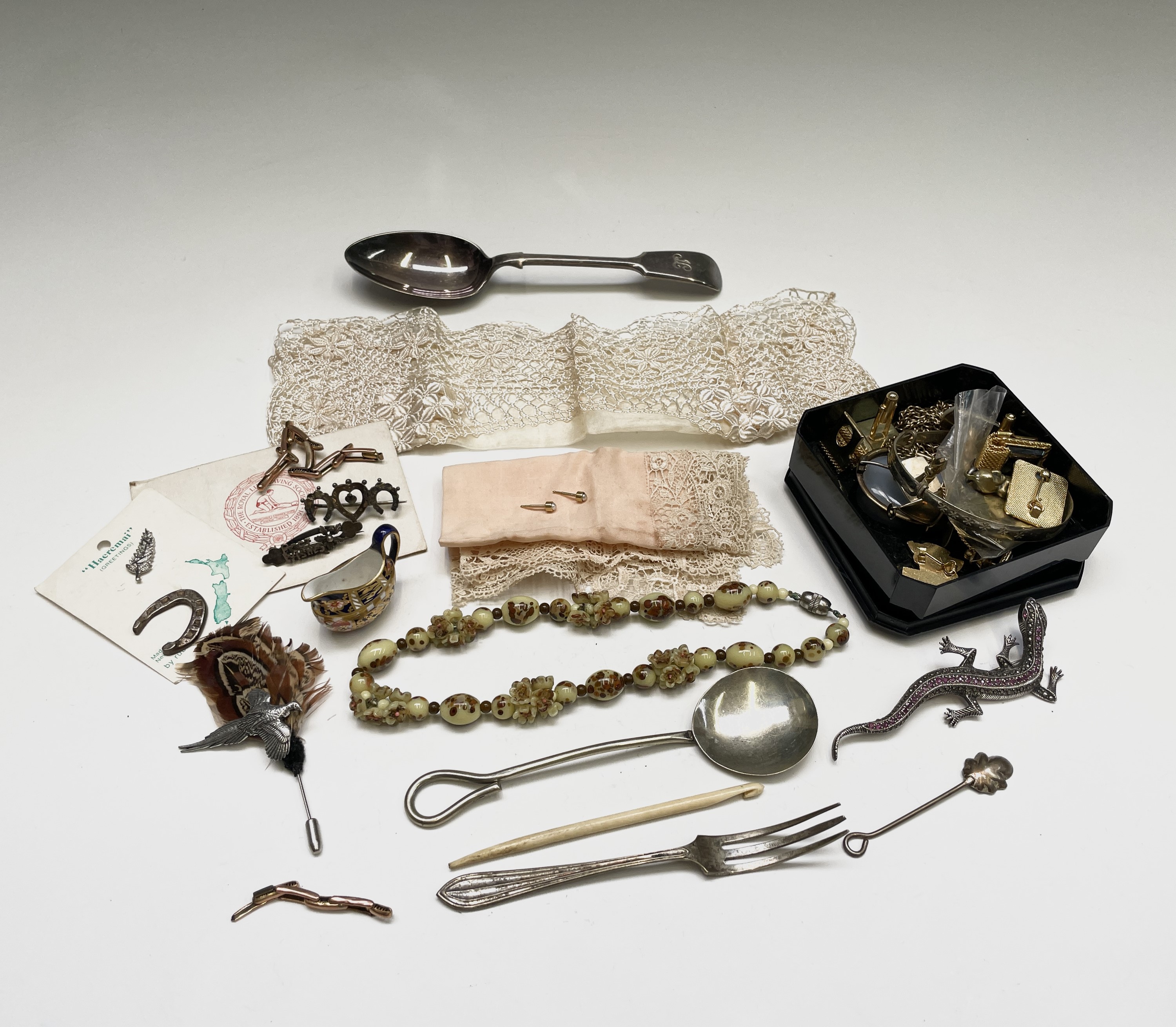 Costume jewellery, plate cutlery, a small amount of silver items including a lucky horseshoe