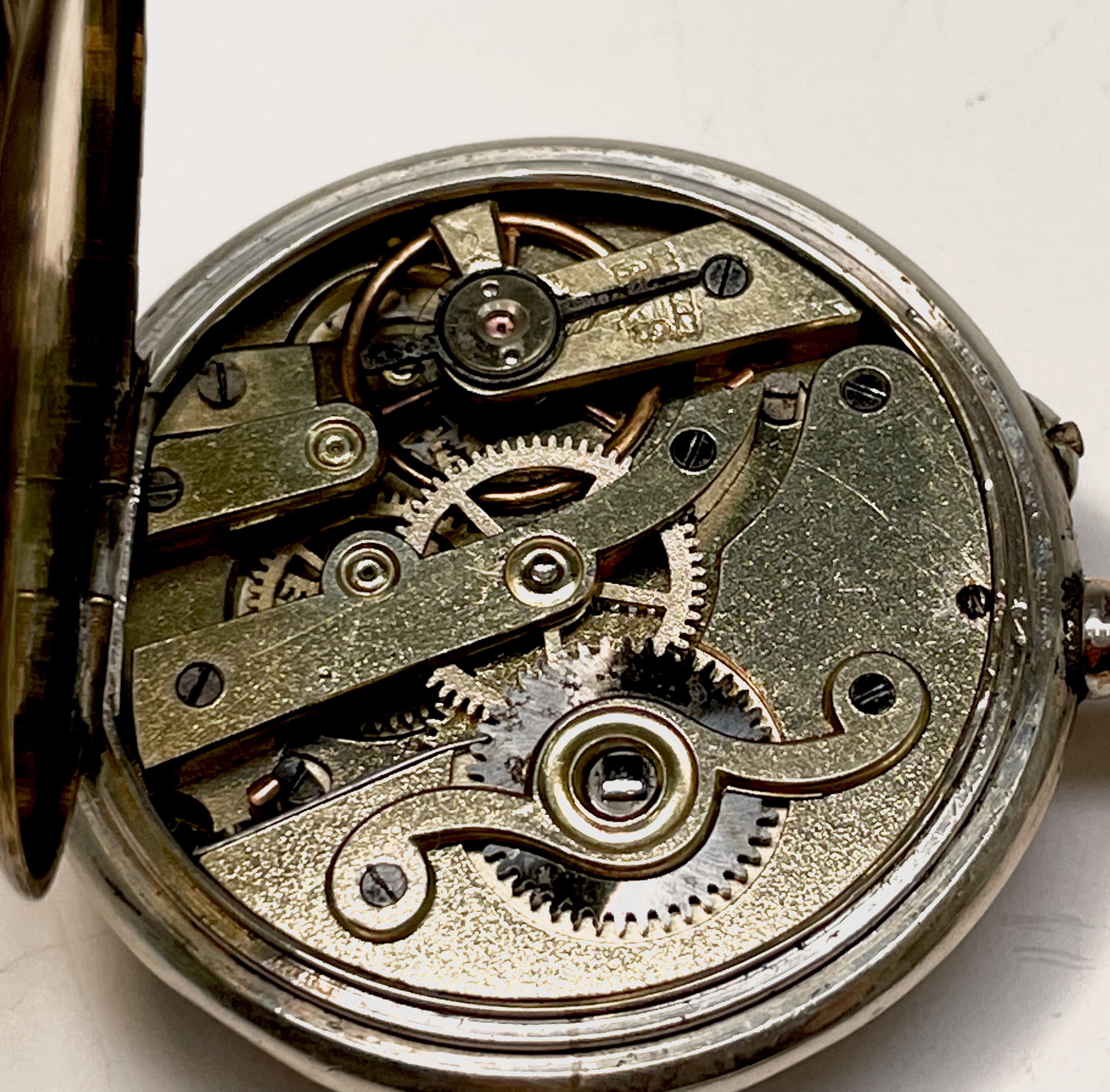 Ten silver cased keyless fob watches each with an ornamental dial and each with engraved decoration. - Image 33 of 60