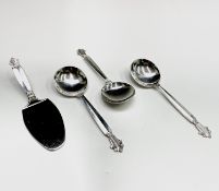 Three silver Georg Jensen Acanthus pattern soup spoons together with a matching silver cake slice,