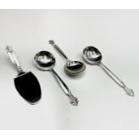 Three silver Georg Jensen Acanthus pattern soup spoons together with a matching silver cake slice,