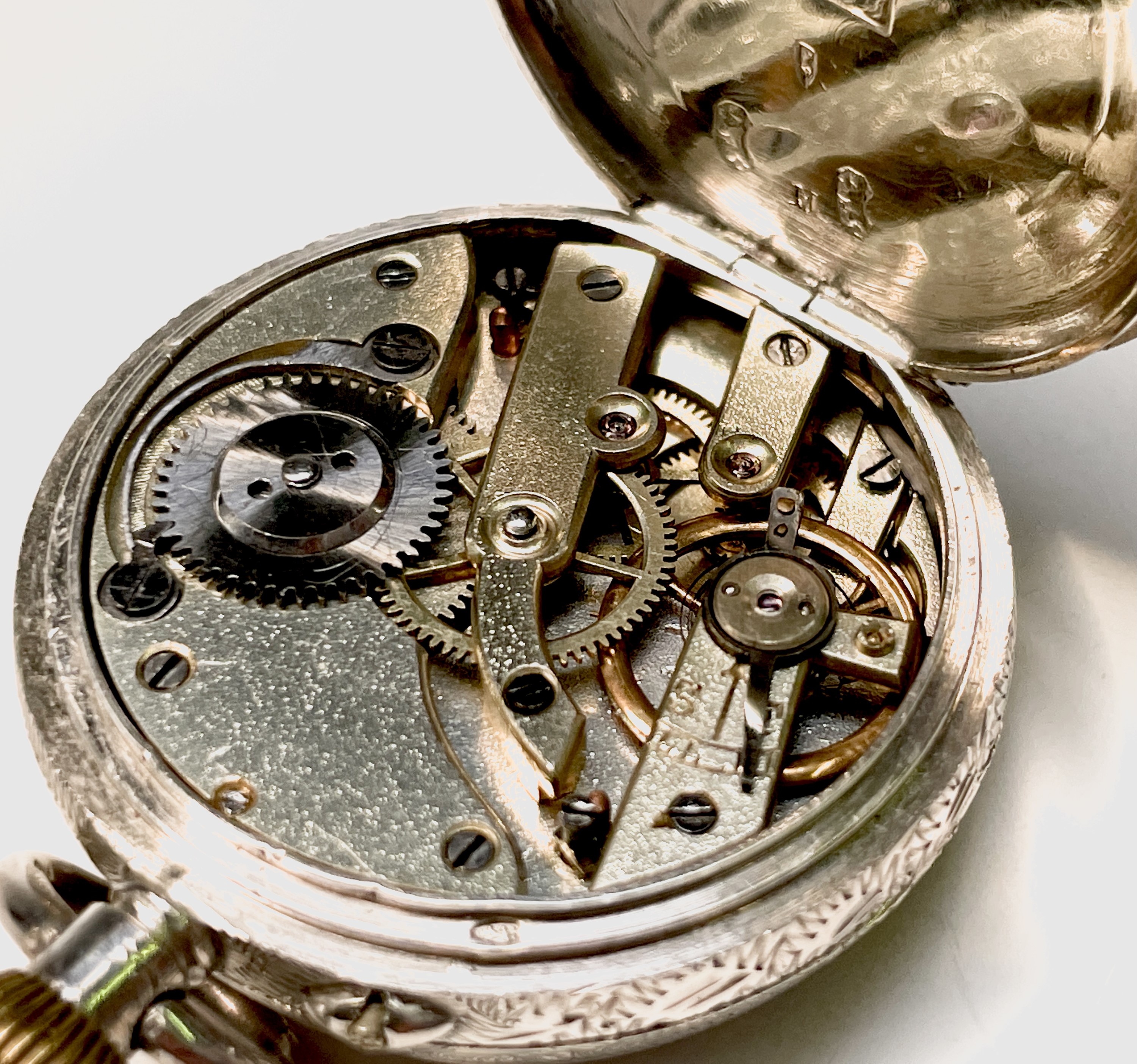 Ten silver cased keyless fob watches each with an ornamental dial and each with engraved decoration. - Image 4 of 60