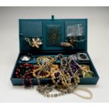 A quantity of costume jewellery, including a 9ct gold chain (2.5g) and some silver and nine