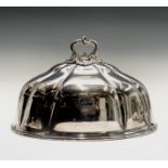 A George IV Sheffield plated meat cover with ornate cast handle and engraved armorial to each side