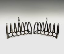 A pair of silver toast racks by Henry Clifford Davis, Birmingham 1951, 3.76oz Condition: No