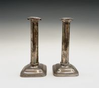 A pair of Edwardian silver candlesticks by Martin, Hall & Co (Richard Martin & Ebenezer Hall) each