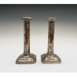 A pair of Edwardian silver candlesticks by Martin, Hall & Co (Richard Martin & Ebenezer Hall) each