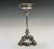 An Elkington silver table centre with a fluted column beneath a beaded bowl with three handles,