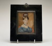 A miniature portrait of a Regency lady with piled coiffure 9x7cm Condition: The glass is broken