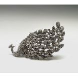 A fabulous and outlandish peacock brooch encrusted with multiple white crystals, total length 11cm.