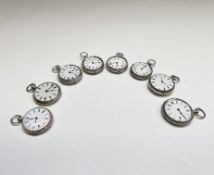 Seven silver key-wind fob watches each with white open face together with another by Lawson and