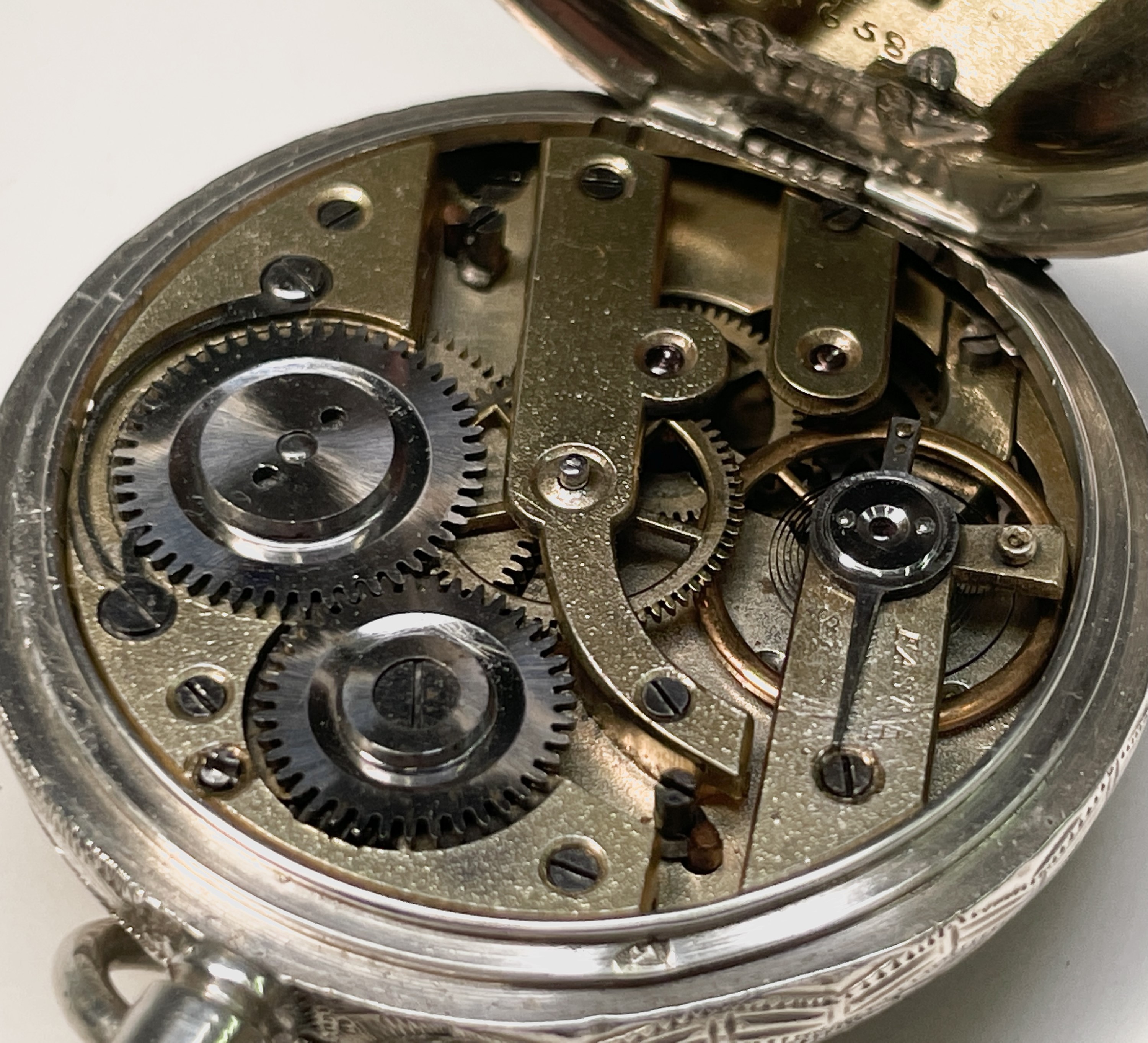 Ten silver cased keyless fob watches each with an ornamental dial and each with engraved decoration. - Image 41 of 60