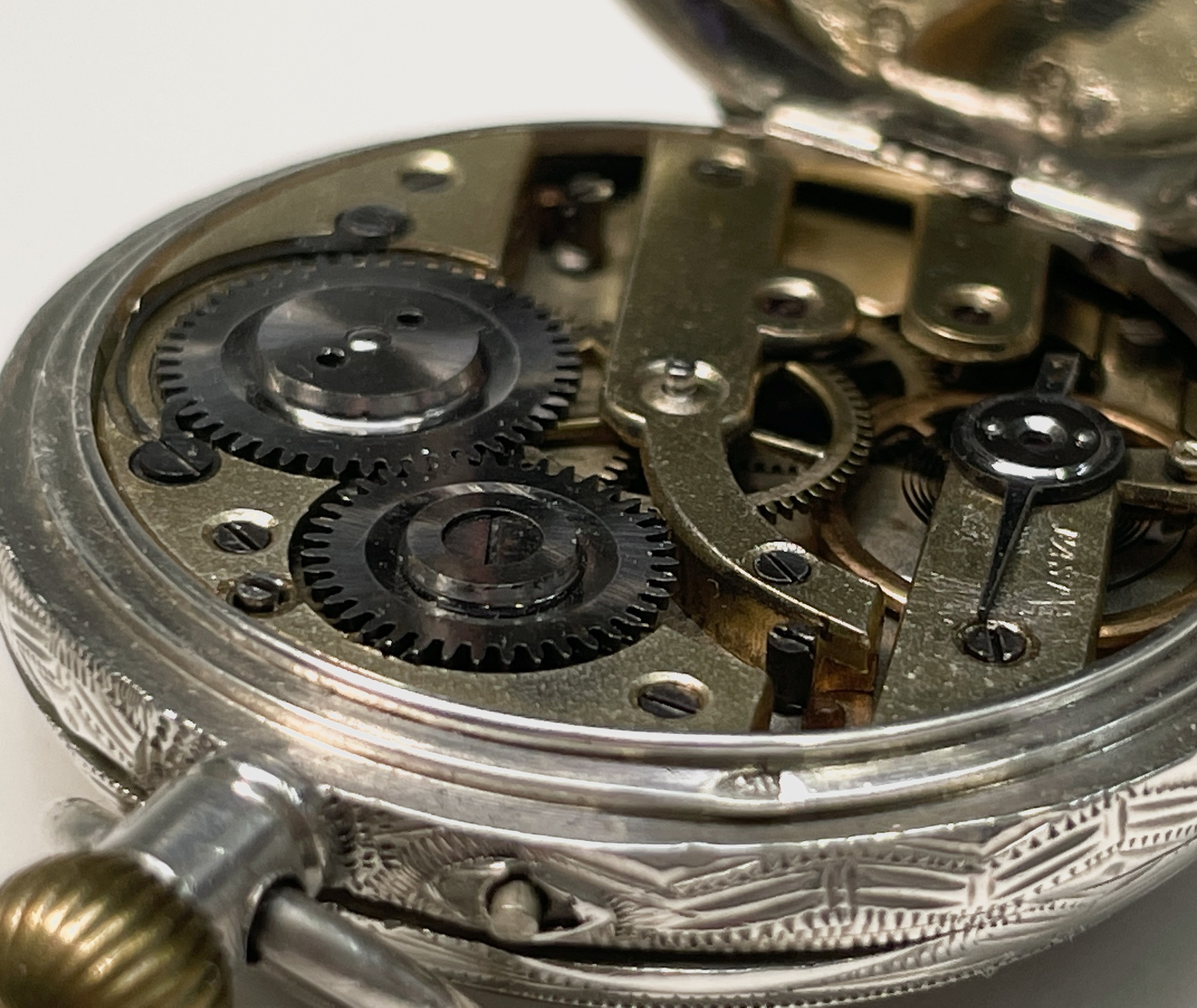 Ten silver cased keyless fob watches each with an ornamental dial and each with engraved decoration. - Image 39 of 60