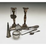 A silver keywind pocket watch, an 18th century small spoon, filled silver candlesticks, a William