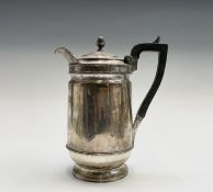 A George IV silver hot water jug with plain cylindrical body by John Emes, London 1825, 23.67oz,