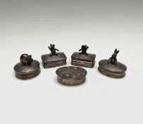 A group of three Elizabeth II silver pillboxes by Ari D Norman, the lid of each with an