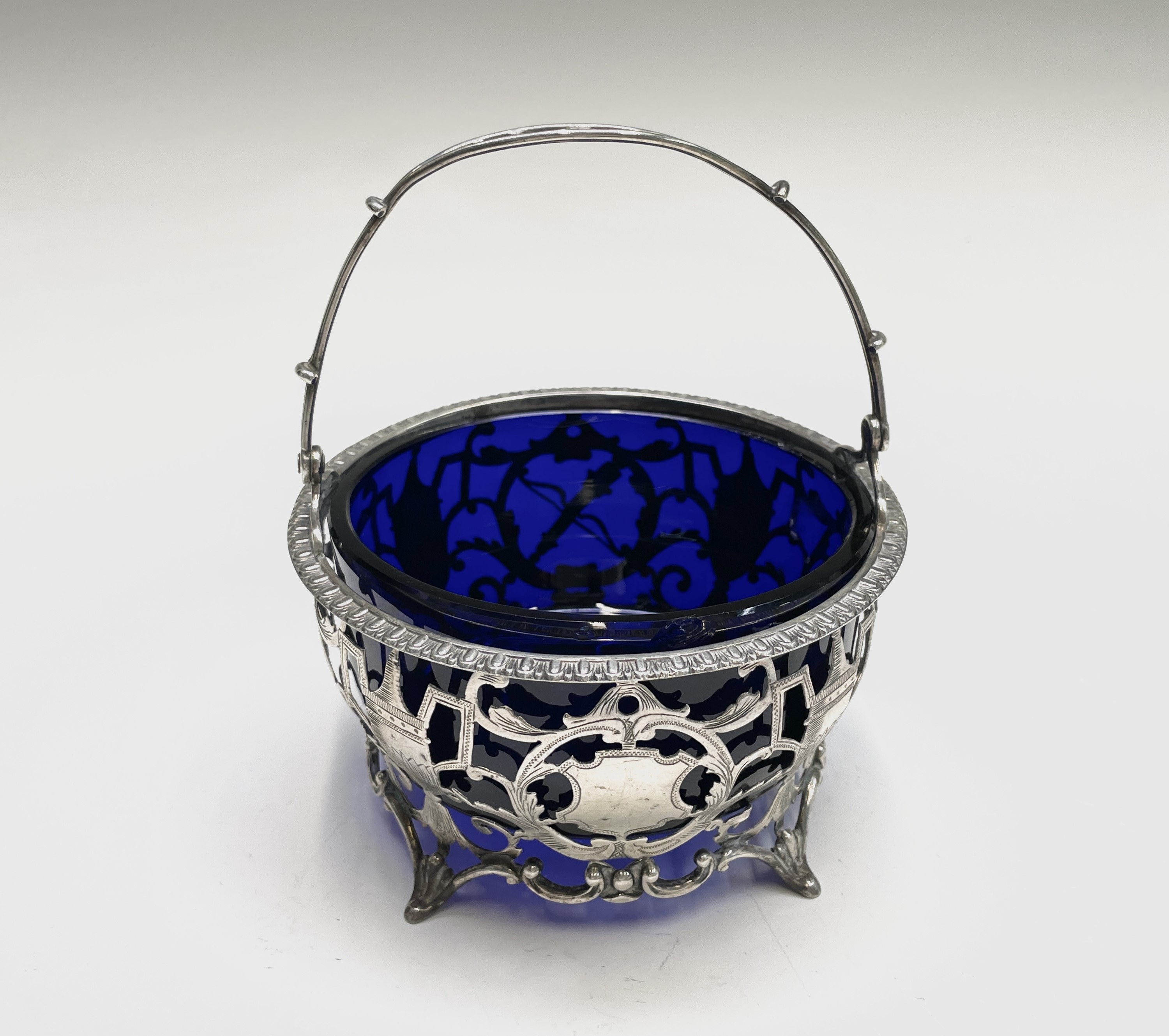 A silver sugar bowl by Goldsmiths & Silversmiths Co Ltd, pierced and engraved in revivalist style, - Image 5 of 14