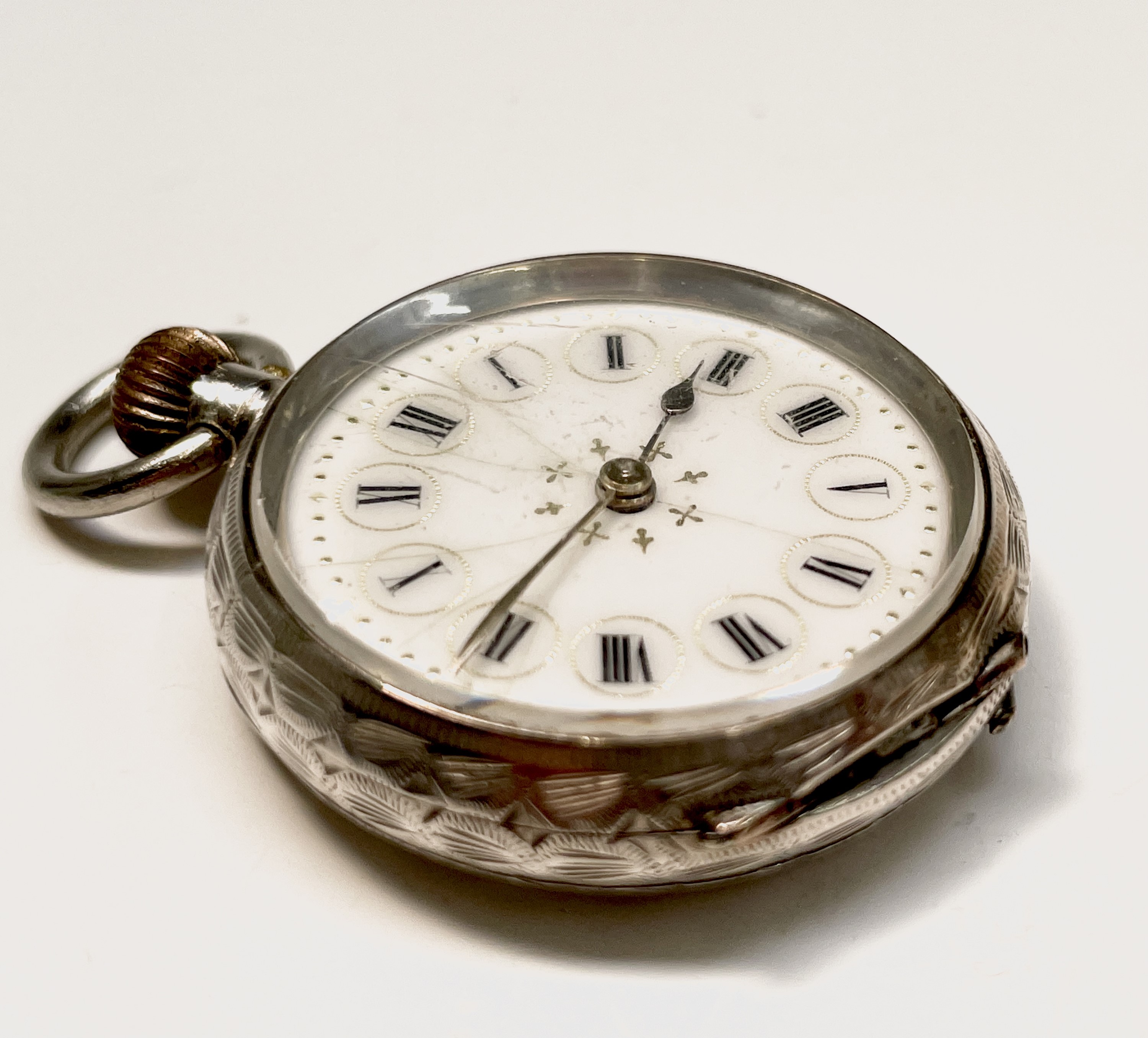 Ten silver cased keyless fob watches each with an ornamental dial and each with engraved decoration. - Image 45 of 60