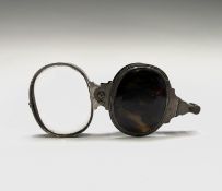 A George III silver and tortoiseshell magnifying glass from the Cornish mansion Penrose.