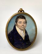A Georgian portrait of a gentleman in a blue coat 6x5cm Condition: Not examined out of the frame but